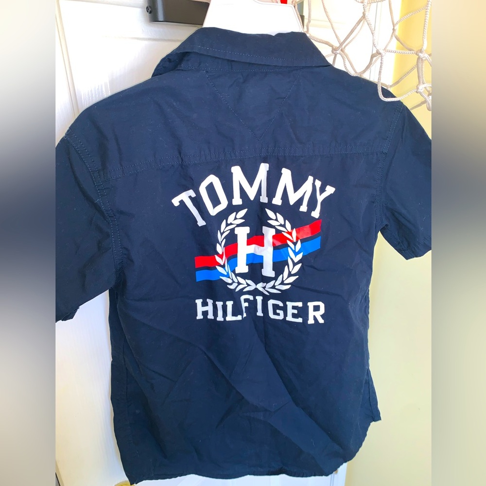 Navy blue Tommy Hilfiger button down with special logo on back. Boys size 12/14